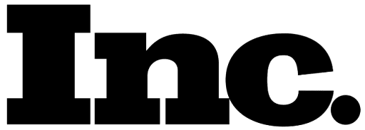A black cat silhouette with an arched back and raised tail on a white background, symbolizing Halloween.