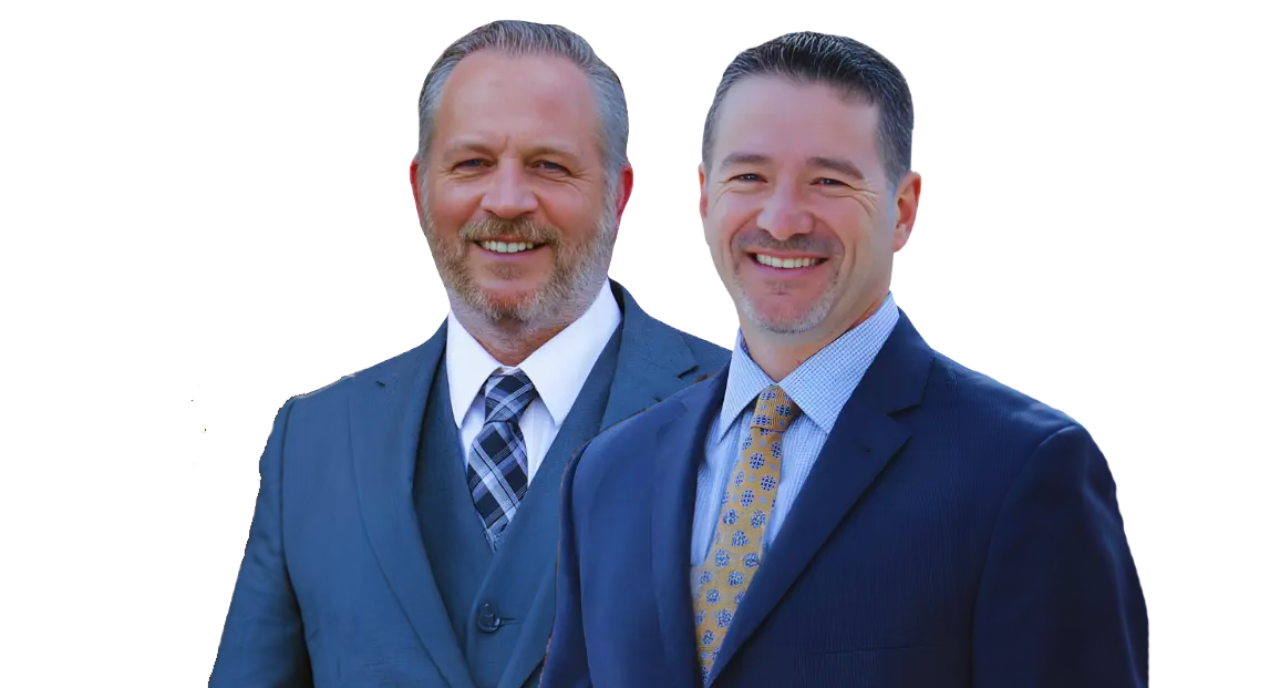 Two professional men in suits smiling, isolated on white background.