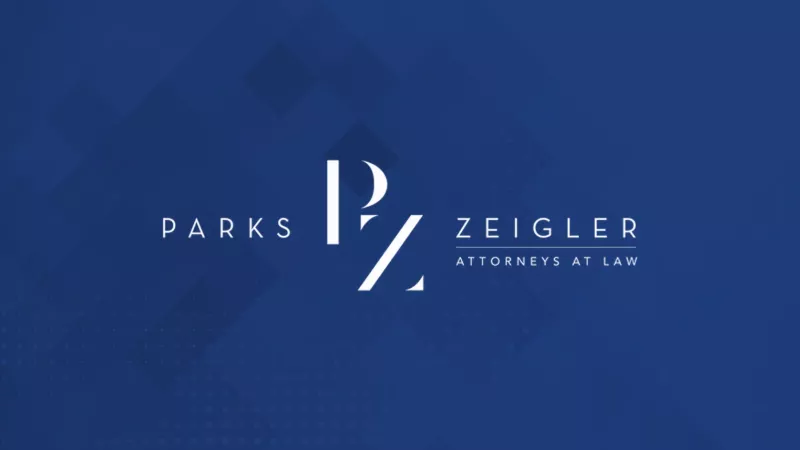 Logo of Parks Zeigler, Attorneys at Law, featuring initials PZ in white on a dark blue background.